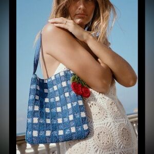 Zara beaded shoulder bag with attached charm